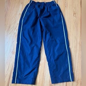 Tek Gear Navy blue track pants with white stripe down the side